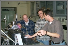 Rick Suenram with Andrey Zuban (middle) and Igor Leonov (right).  Andrey and Igor were outstanding hardware and software specialists and in 1998 developed a software package allowing unattended searches spanning many GHz to be performed with the FTMW spectrometer.