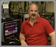 David Plusquellic, at NIST from the mid 1990's, developer of the JB95 program for efficient analysis of rotational spectra.  He is currently (2012) involved in development of broadband, terahertz chirped pulse spectroscopy and is pictured next to the high speed oscilloscope used for averaging the free induction decay signals.